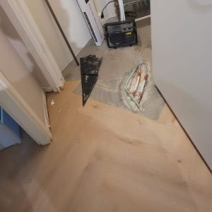 Reparatie na een lekkage in de vloer