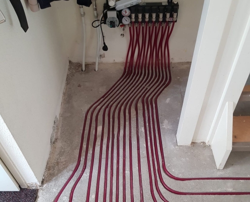 PVC-vloer-met-vloerverwarming-installatie PVC vloer met vloerverwarming