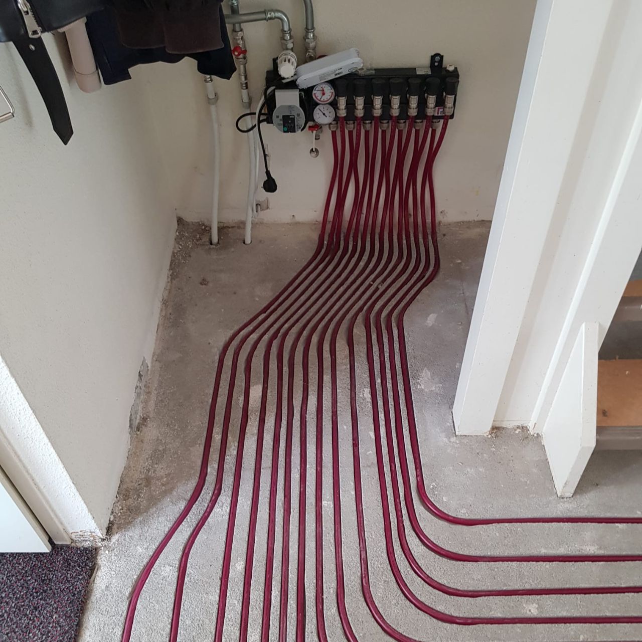 PVC-vloer-met-vloerverwarming-installatie PVC vloer met vloerverwarming