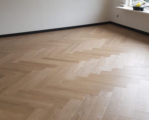 Visgraatvloer laten leggen Visgraatvloer laten leggen